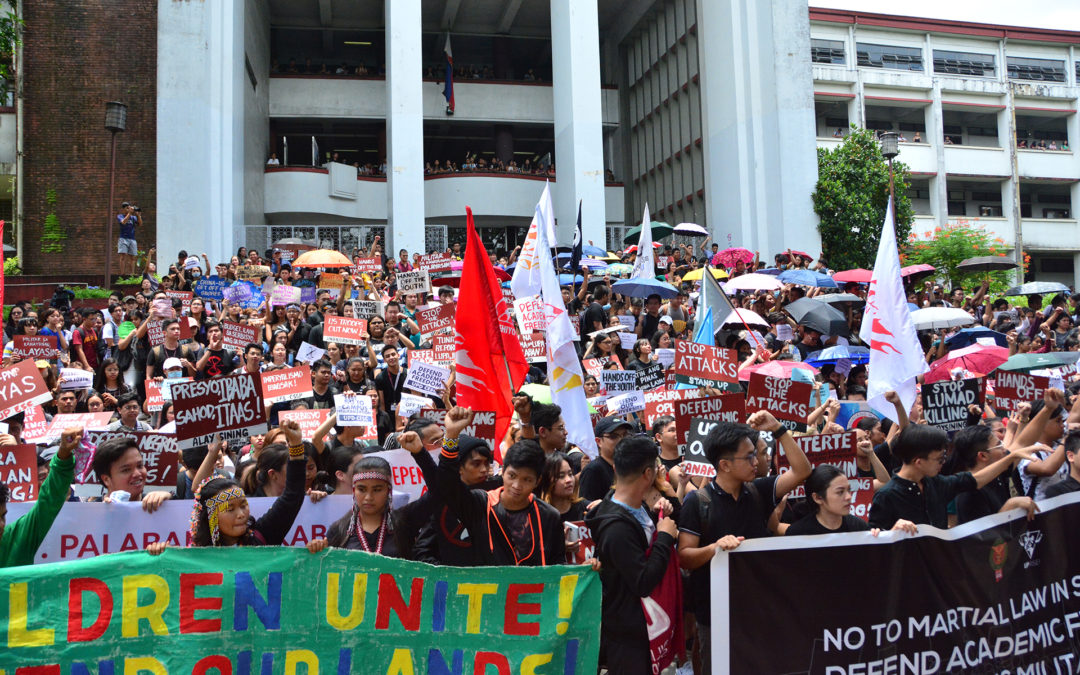 UP students and profs stage walk outs to protest ‘militarization’ on campus