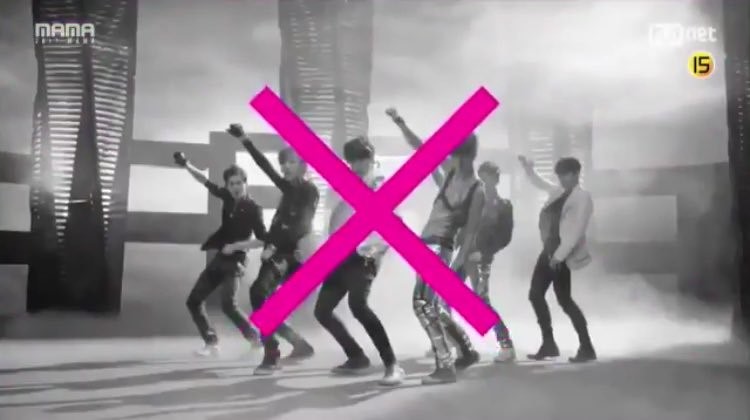 Fans tell Mnet to apologize for videos throwing shade at EXO