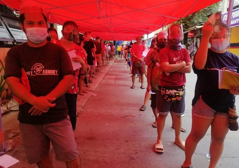 Long queues mark start of cash distribution in QC